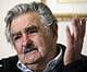 Former guerrilla leader and Uruguay's leading presidential candidate Jose Mujica gestures during a Reuters interview in Montevideo